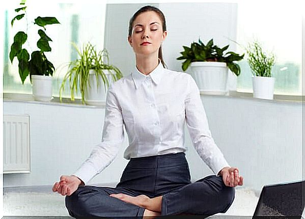 woman meditating at work