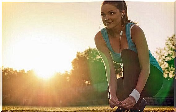 woman doing exercise outdoors.