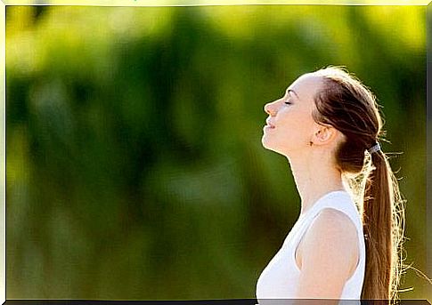 woman practicing deep breathing