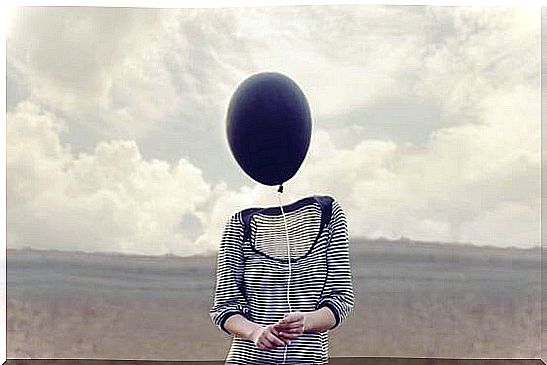 Woman with balloon in place of the head