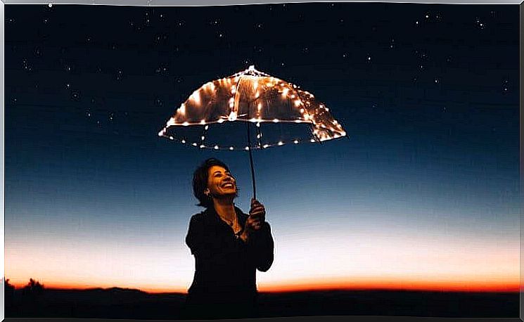 Woman with lighted umbrella