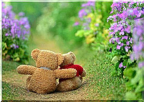 Teddy bears hugged with gratitude