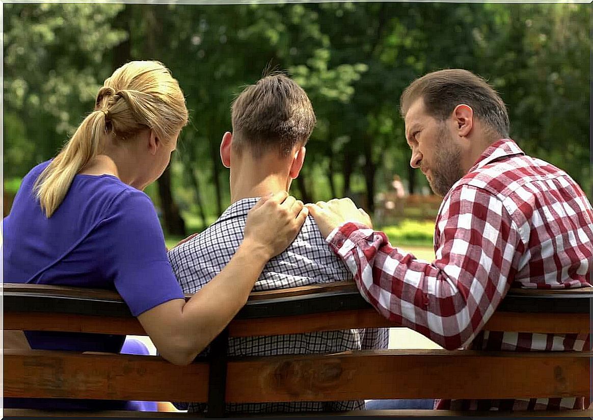 Parents supporting their teenager