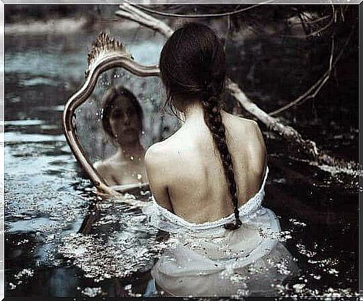 mirror-woman-seeking-light-darkness