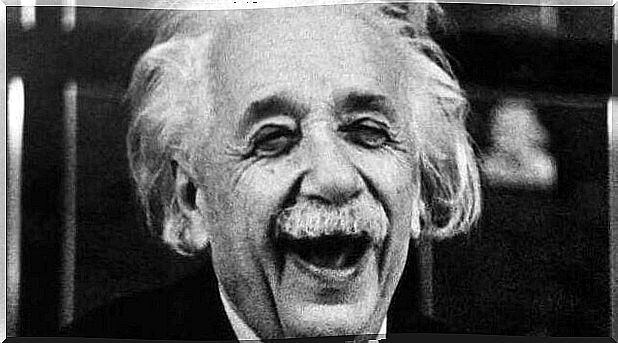 Albert Einstein laughing