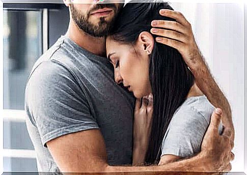 man embracing woman without motivation