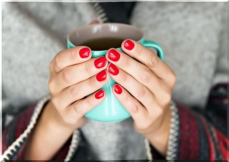 woman having cup of tea