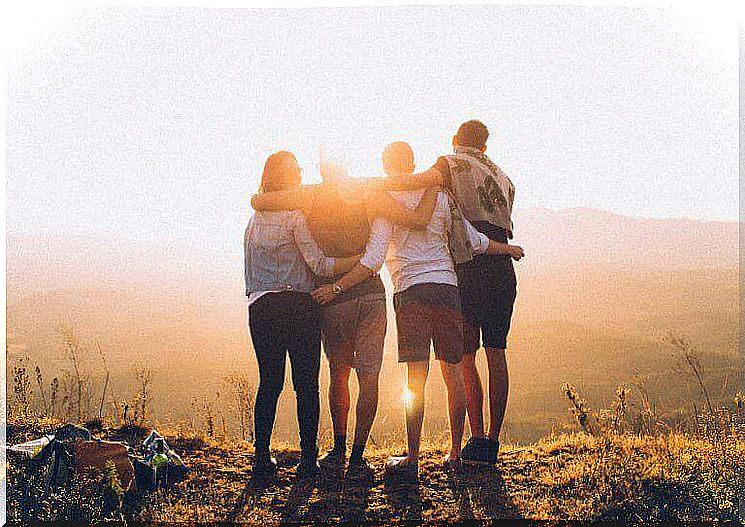 group of friends in beautiful landscape