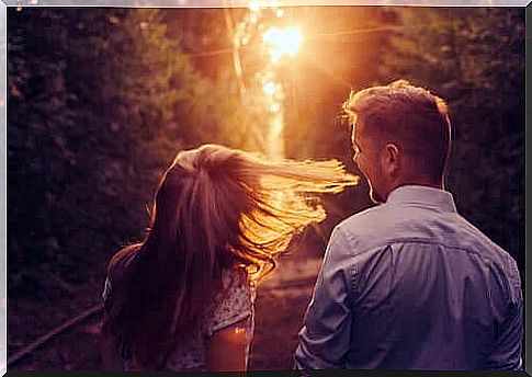 couple walking at dusk